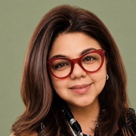 Sumona Singhal, smiling